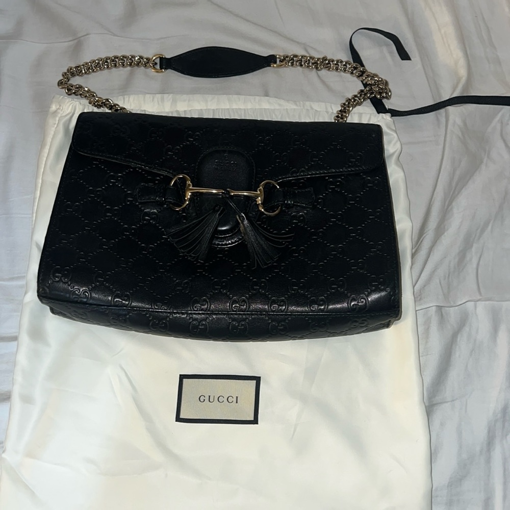 Black leather Gucci logo purse